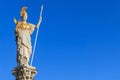 The statue of Pallas Athena on blue background Vienna, Austria