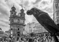 Statue of the parrot of Ravachol in the Plaza de la Peregrina in Pontevedra with the church of the Pilgrim Virgin