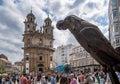 Statue of the parrot of Ravachol in the Plaza de la Peregrina in Pontevedra with the church of the Pilgrim Virgin