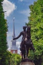 Statue of Paul Revere and spire of Old North Church between tree Royalty Free Stock Photo