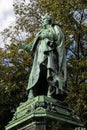 Statue of the Peter von Cornelius in a lush green park