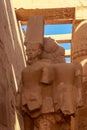 Statue of pharaoh in Karnak Temple Complex in Luxor, Egypt Royalty Free Stock Photo