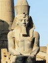 Statue of Pharaoh Ramses II in the great temple of Karnak dedicated to the cult of Amun, in the city of Luxor in Egypt Royalty Free Stock Photo