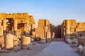 Statue of Pharaoh Ramses II standing in front of the ruins temple Royalty Free Stock Photo