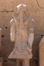 Statue of pharaoh at the temple of Karnak in Luxor, old Egypt Royalty Free Stock Photo