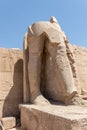 Statue of pharaoh at the temple of Karnak in Luxor, old Egypt Royalty Free Stock Photo
