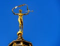 Statue of Pheme at Grand place Brussels