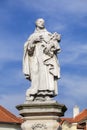 Statue of Philip Benizi de Damiani on the Charles bridge in Prague Royalty Free Stock Photo