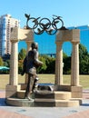 Statue of Pierre De Coubertin and Olympic sculpture in downtown Atlanta, Georgia