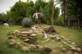 Statue in a place with lots of vegetation, located in a theme park.