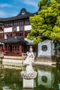 Statue on a pond in Fang Bang Zhong Lu old city shanghai china Royalty Free Stock Photo