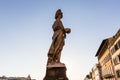 A statue at the Ponte Santa Trinita bridge in Florence, Italy Royalty Free Stock Photo