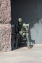 Statue of poor man listening to radio Royalty Free Stock Photo