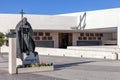 Statue of Pope John Paul II with the Basilica of Most Holy Trinity in background Royalty Free Stock Photo