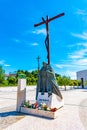 Statue of pope John Paul II and High Cross at Fatima, Portugal Royalty Free Stock Photo