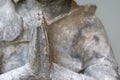 Statue praying. Selective focus image of hands in prayer