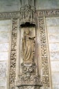 The statue of the priest is a fragment of the interior of the Catholic Cathedral.