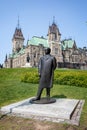 Statue of prime Minister Mackenzie King in front of the East block of the Parliament of Canada , Ottawa, Ontario, Canada