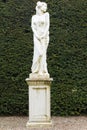 Statue of princess in gleams garden Royalty Free Stock Photo