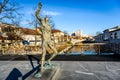 Statue of Prometheus on Butchers` bridge over river Ljubljanica,