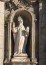 Statue of the Prophet Elijah on the left side of the entrance to the Carmo Church in Porto, Portugal. Royalty Free Stock Photo