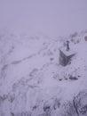 Statue of Pyrene under the snow at the pic du midi in the Pyrenees Royalty Free Stock Photo