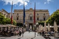 A statue of Queen Victoria in front of the National Library of Malta in Republic Square, Valletta, Malta. .