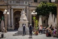 A statue of Queen Victoria in front of the National Library of Malta in Republic Square, Valletta, Malta. .