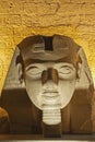 Statue of Ramses II head at entrance to Luxor Temple during night Royalty Free Stock Photo