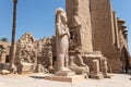 The statue of Ramses II with his daughter Merit-Amon in the temple of Amun-RA in Karnak, Luxor, Egypt Royalty Free Stock Photo