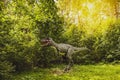 Statue of realistic dinosaur in a forest Royalty Free Stock Photo