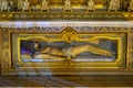 statue representing Jesus Christ lying dead in gilded carving inside the Jeronimos church