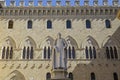 Statue representing Sallustio Bandini in Salimbeni square in Siena Royalty Free Stock Photo