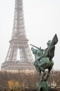 Statue of resurgent France pointing towards the Eiffel Tower from the Bir Hakeim bridge in Paris 1 Royalty Free Stock Photo