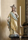 Statue of the resurrected Jesus with his sacred heart in the Church of Saint George in Varenna, Italy.