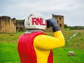 Statue of RNLI lifeboat man looking out to sea through binoculars Royalty Free Stock Photo