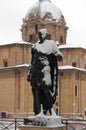 Statue of roman emperor Julius Caesar under snow