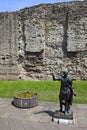 Statue of Roman Emperor Trajan and Remains of London Wall