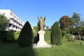 A statue of the Sacred Heart of Jesus in the garden. Royalty Free Stock Photo