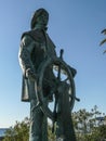 Statue of a sailor at the helm