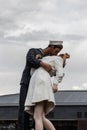 A statue of a sailor kissing a girl located in Portsmouth dockyard, replicating the famous