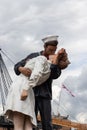 A statue of a sailor kissing a girl located in Portsmouth dockyard, replicating the famous