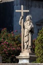 Statue of Saint Agatha holding a book and a cross