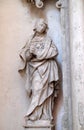 Statue of Saint on the altar of the Saint Mary Magdalene in Cistercian Abbey of Bronbach in Reicholzheim, Germany