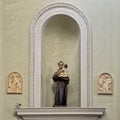 Statue of Saint Anthony of Padua holding Jesus in the Church of Santa Maria Maddalena in Castiglione del Lago, Italy.