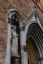 Statue of a saint at the entrance of a church in Toulouse, France