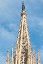 Statue of Saint Eulalia, patron saint of the city, on the spire of the Metropolitan Cathedral Basilica of Barcelona, located in Royalty Free Stock Photo