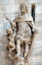 Statue of Saint on the facade of the Milan Cathedral, Duomo di Santa Maria Nascente, Milan, Italy Royalty Free Stock Photo