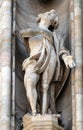 Statue of Saint on the facade of the Milan Cathedral, Duomo di Santa Maria Nascente, Milan, Italy Royalty Free Stock Photo