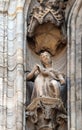 Statue of Saint on the facade of the Milan Cathedral, Duomo di Santa Maria Nascente, Milan, Italy Royalty Free Stock Photo